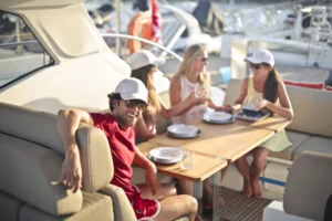 Swinger party with group of adults enjoying time on a yacht