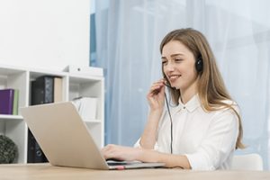 female IT business owner providing technical support to customers
