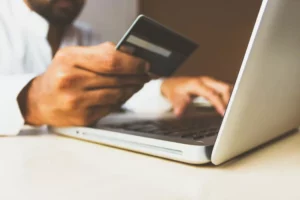 Man paying online with his credit card