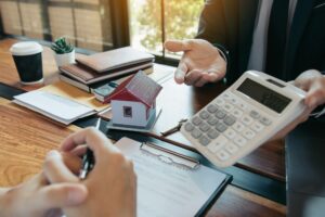 person extending a calculator loan to value ratio calculator