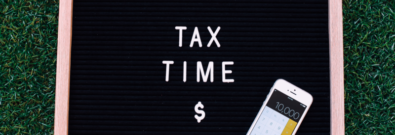 sign saying tax time EIN vs TIN