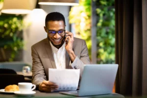 businessman on the phone setting up ACH authorization form