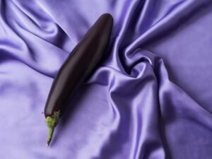 eggplant on silk sheets - sell sex toys online