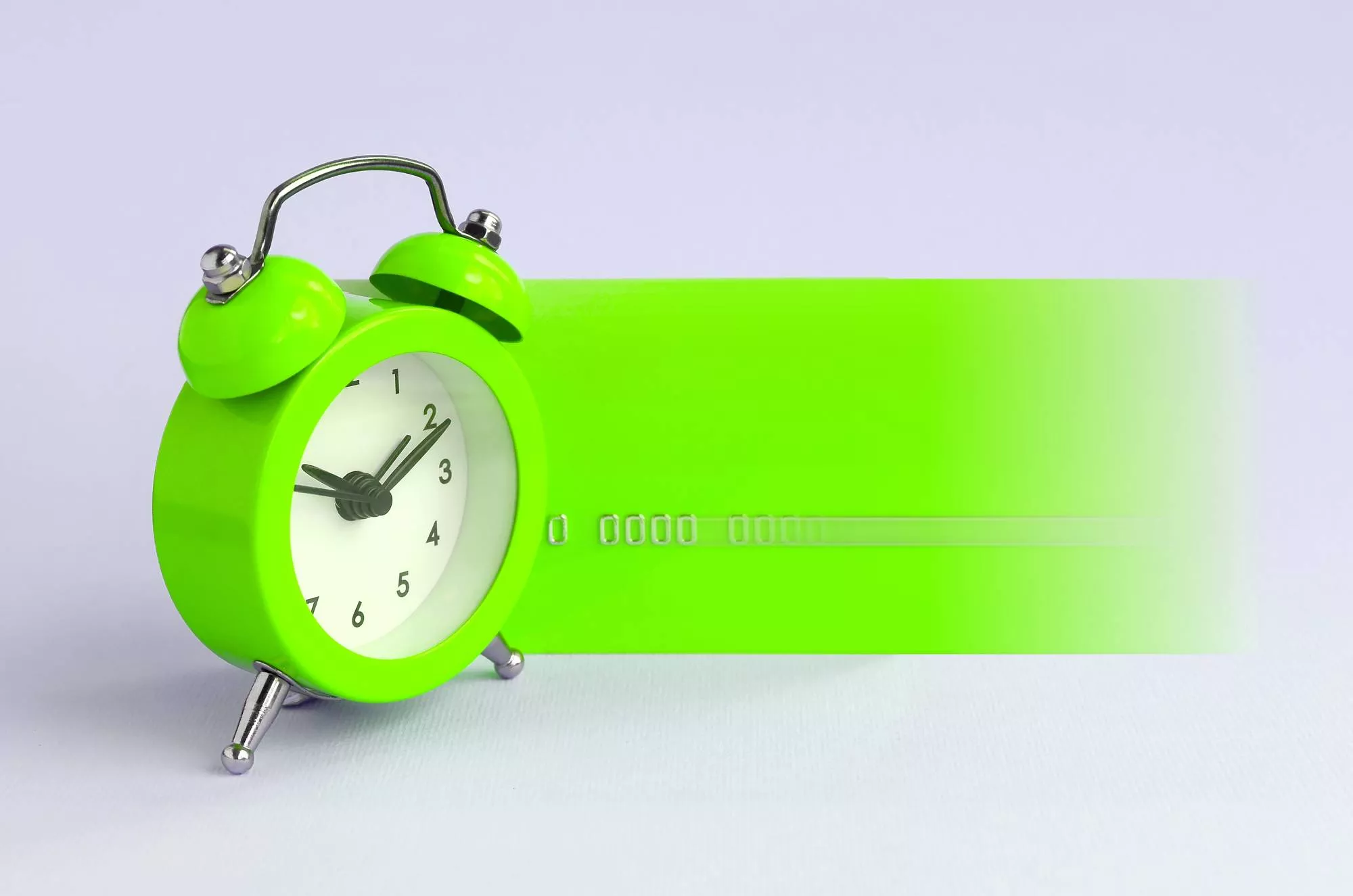 neon green ticking clock and credit card symbolizing batch processing