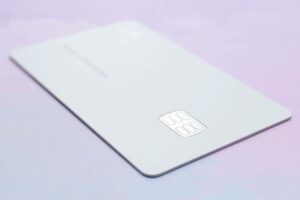 a credit card on a purple background ready to be used for storing credit card information