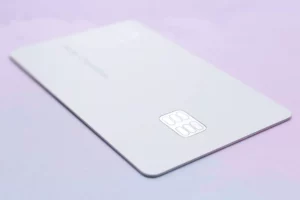 a credit card on a purple background ready to be used for storing credit card information