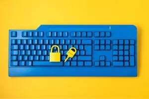 image of a keyboard with a lock and key representing safe data with data encryption