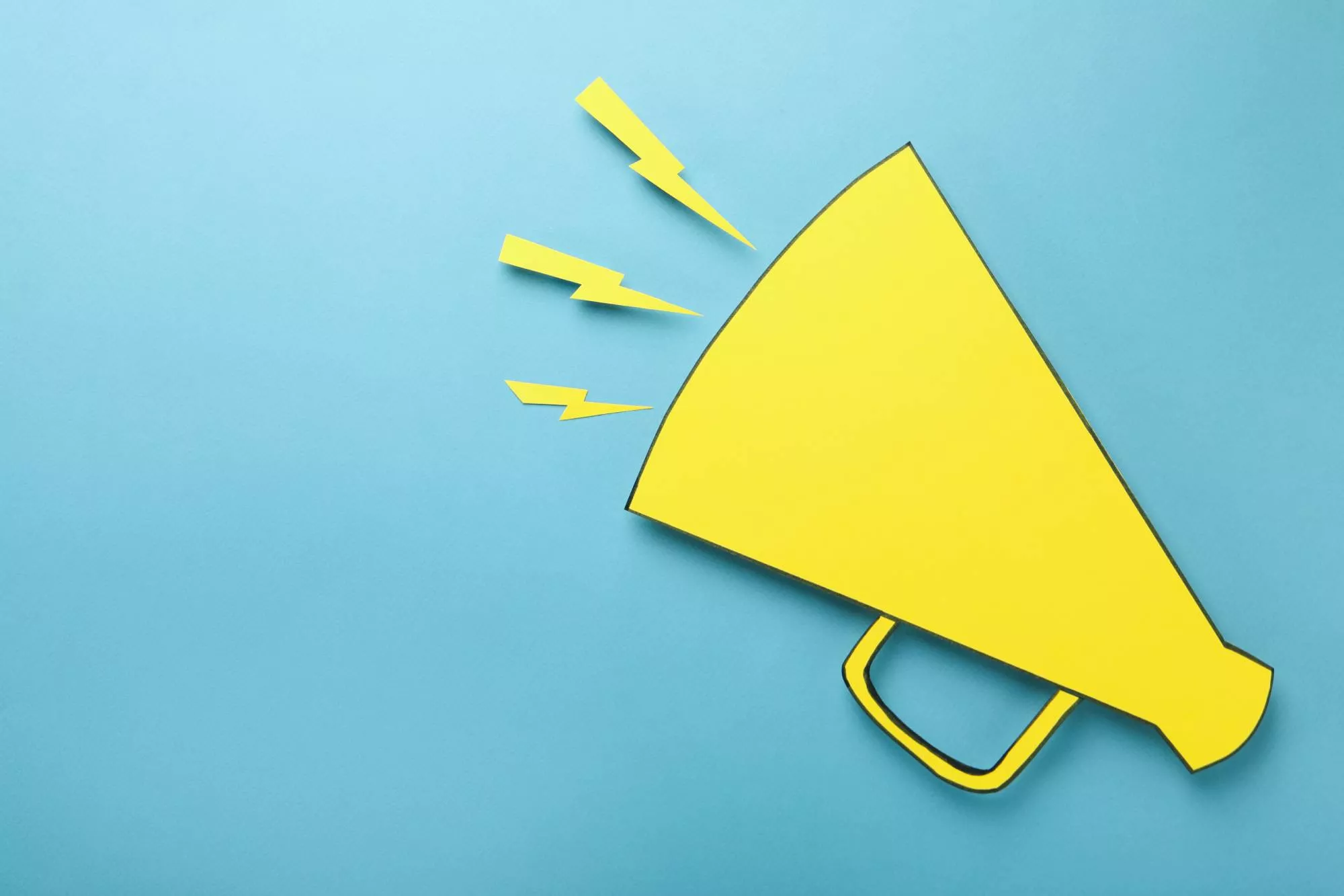 a yellow megaphone drawing on a blue background used to talk about voice authorization fee