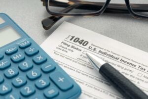 opening a business bank account and using 1040 to file taxes for business