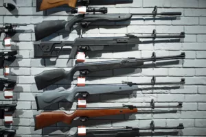 rifles on showcase at a gun store subject to an FFL transfer fee