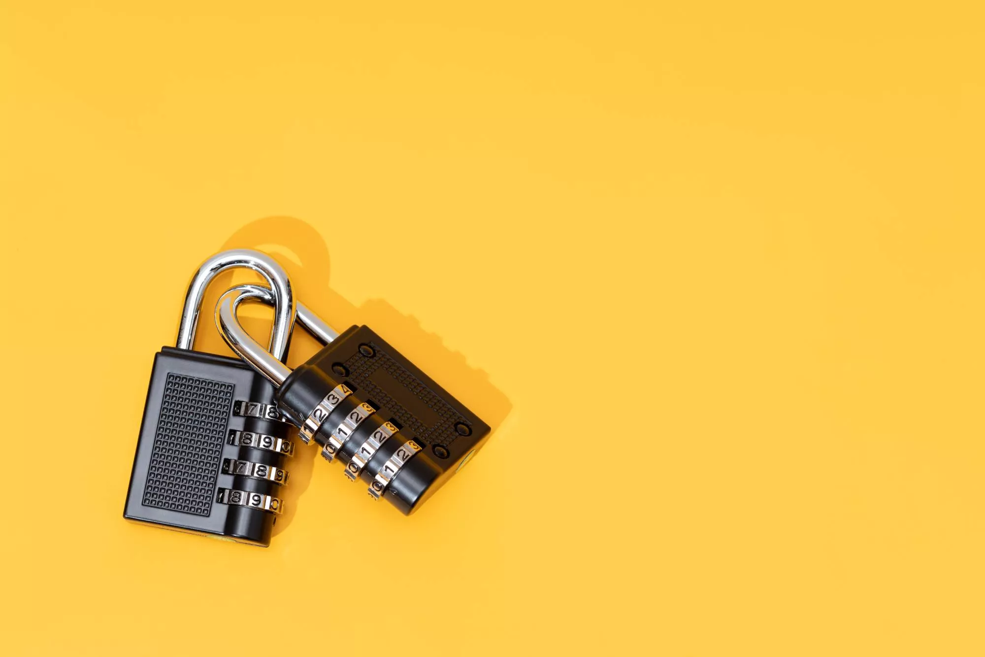 Two locks on a yellow background to show how secure ssl certificates work