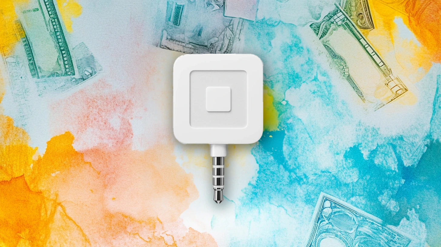 A Square card reader placed on a colorful watercolor background with subtle imagery of currency