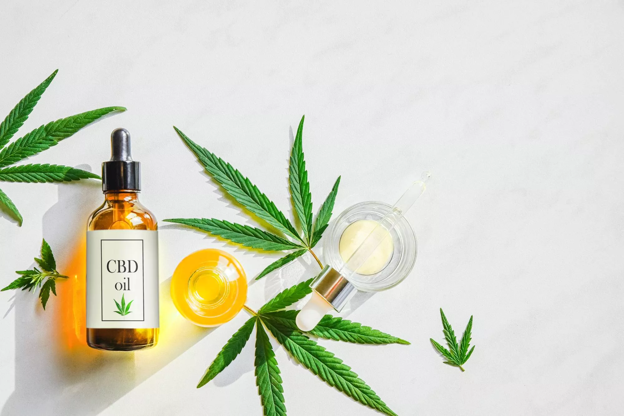 CBD products sold on WooCommerce on a white background