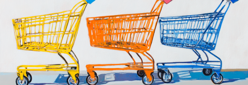 three shopping carts against a blank background as a merchant debates merchant account vs stripe