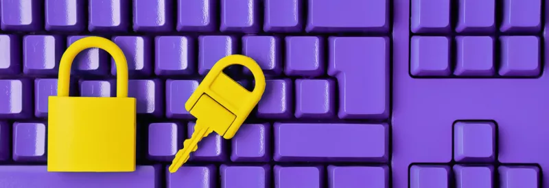 a purple computer keyboard with a yellow lock and key on it to represent a payment gateway