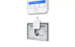 A phone connected to a Square magstripe card reader and accepting an AMEX card.