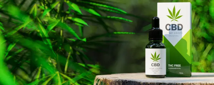 Arizona CBD products on a tree stump.