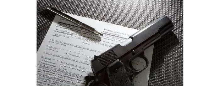 Gun plus paperwork needed for applying for an FFL in Missouri.