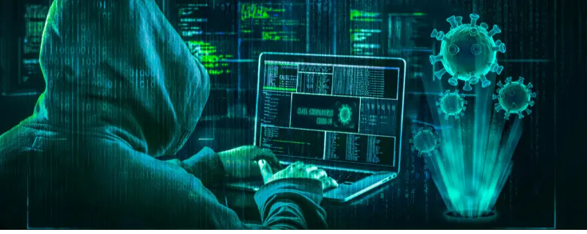 A person in a hoodie performing a scam online