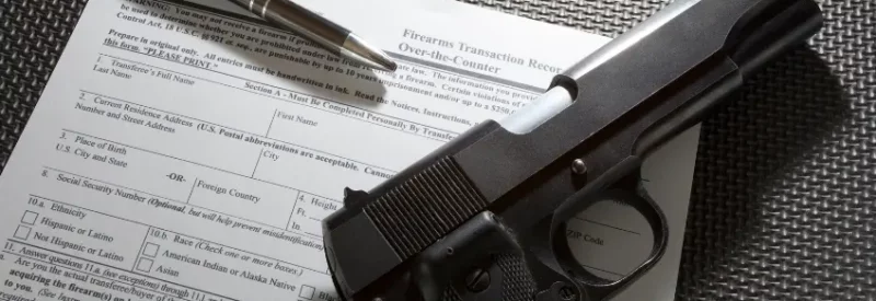 A form with a pen and pistol on top for ffl Indiana dealers