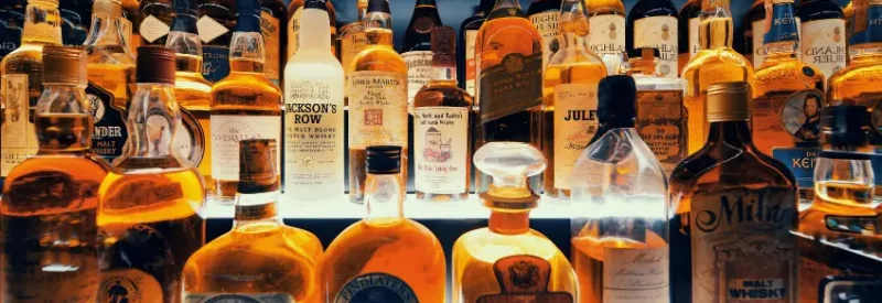 A group of alcohol bottles sold with a New Jersey liquor license.