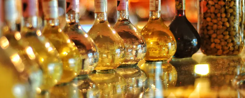 Bottles of alcohol on a counter, sold through a Missouri liquor license.