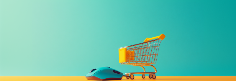 A blue computer mouse connected to an orange miniature shopping cart