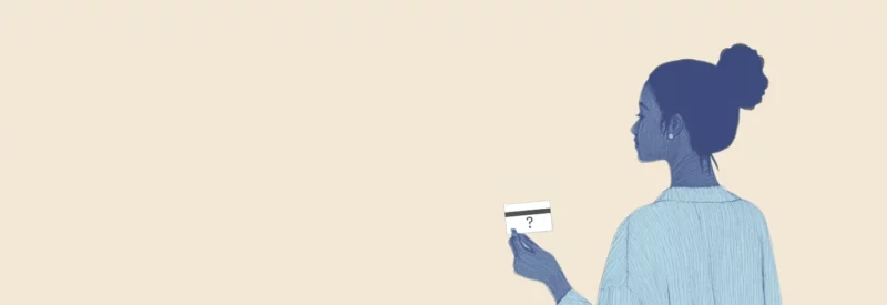 Woman holding invalid account number credit card