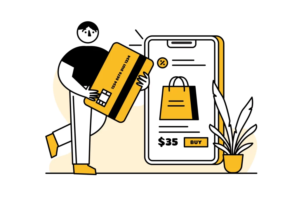 a man wearing a black t-shirt and holding a large credit card in front of a mobile device showing an checkout page on eCommerce platform using PFaaS for a transaction